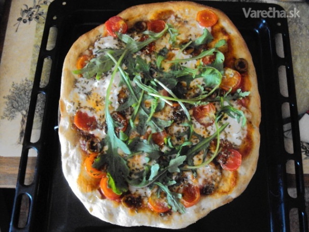 Pizza caprese con rucola fresca recept
